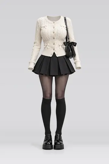 Ivory knit cardigan + black pleated mini skirt
