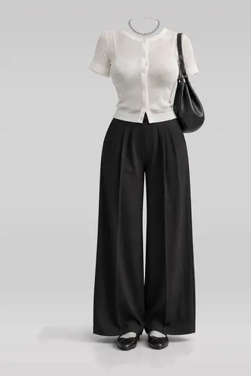 Ivory cardigan + black pleated bag