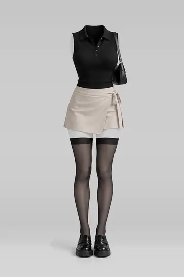 Black knit top + beige mini skirt