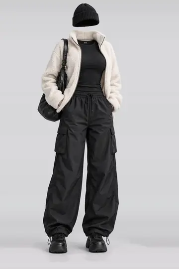 Ivory jacket + black trousers